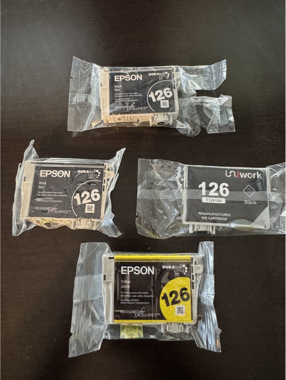 Epson Printer Ink 126 T1261  3 black, 1 sealed, 1 open, 1 off brand, 1 yellow